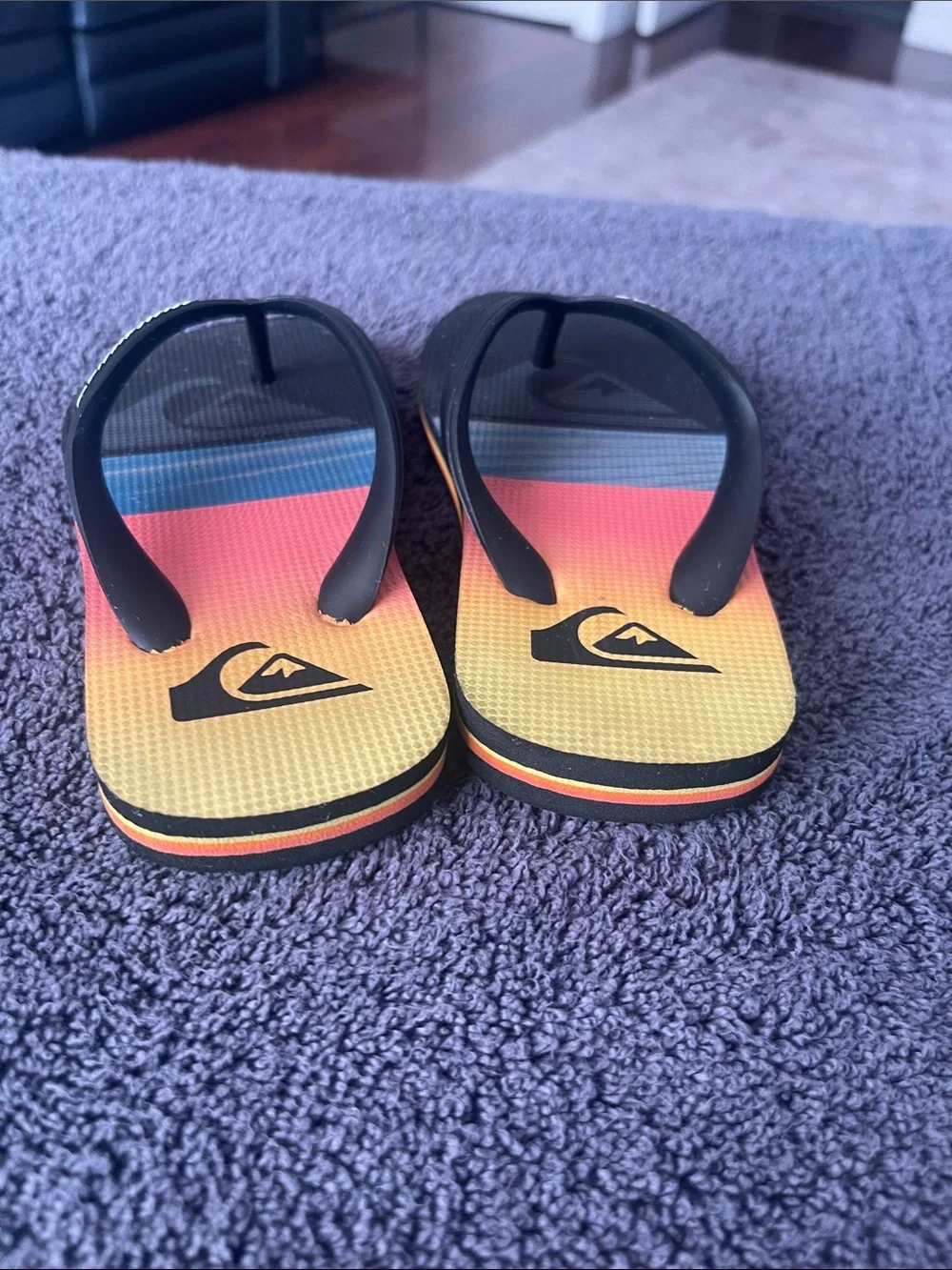 Quiksilver Kids Black Flip Flops with Yellow, Orange and Blue Gradient Footbed